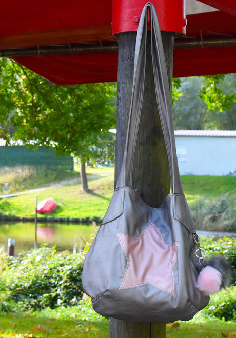 kunstleder-altsilber-rosa-beuteltasche